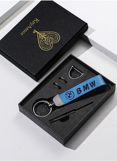 Elegant blue metal and leather keychain with BMW logo featuring 3 key rings perfect as a fancy gift or car accessory designed in sleek blue for a modern look offers 360 degree rotation for convenience suitable for both men and women and comes in a gift box