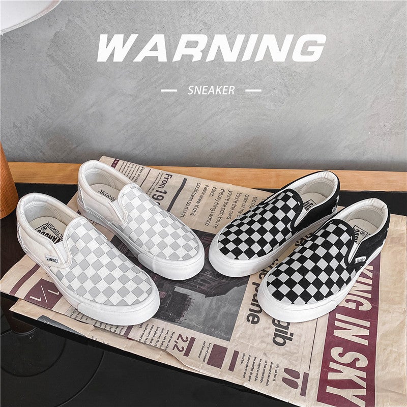 Black and White Checkered Canvas Low Top Sneakers - Image 1