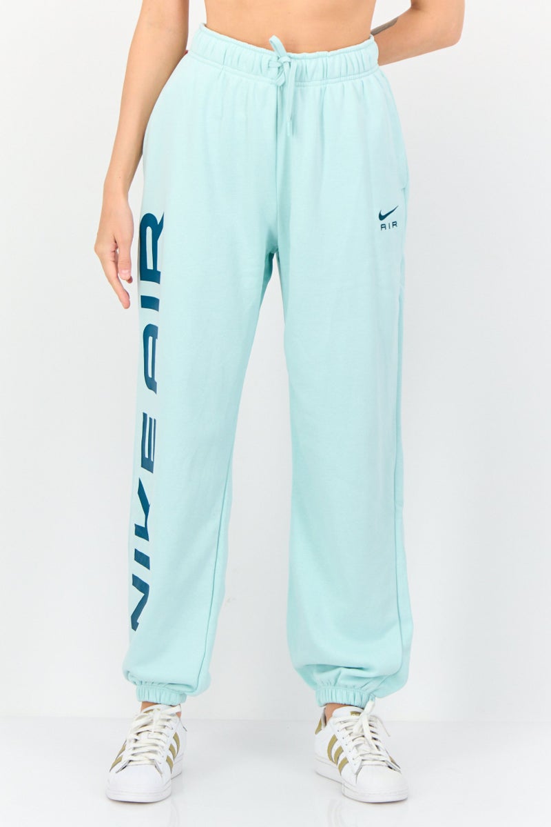 Nike Women Sportswear Fit Outdoor Sweatpants, Turquoise - Image 1