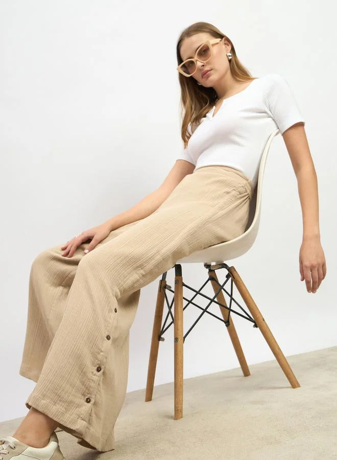 Styli Textured High Rise Wide Leg Pants with Buttons Detail