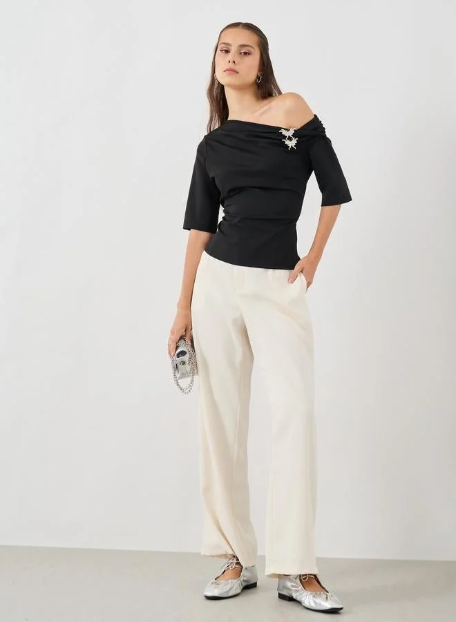 Take Two Solid Asymmetric Neckline Top with Bow Detail