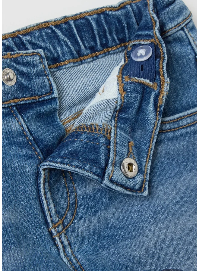 او في اس Five-pocket jeans with Mickey Mouse print