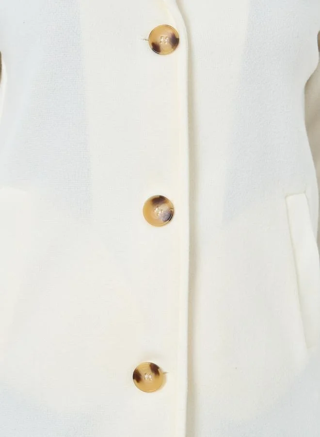 تايك تو معطف بلون سادة بتفاصيل جيوب يشبه الصوف