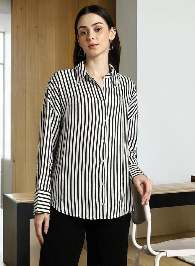 دينيس لينغو بلوزة مخططة واسعة بأزرار غلق وأكمام طويلة