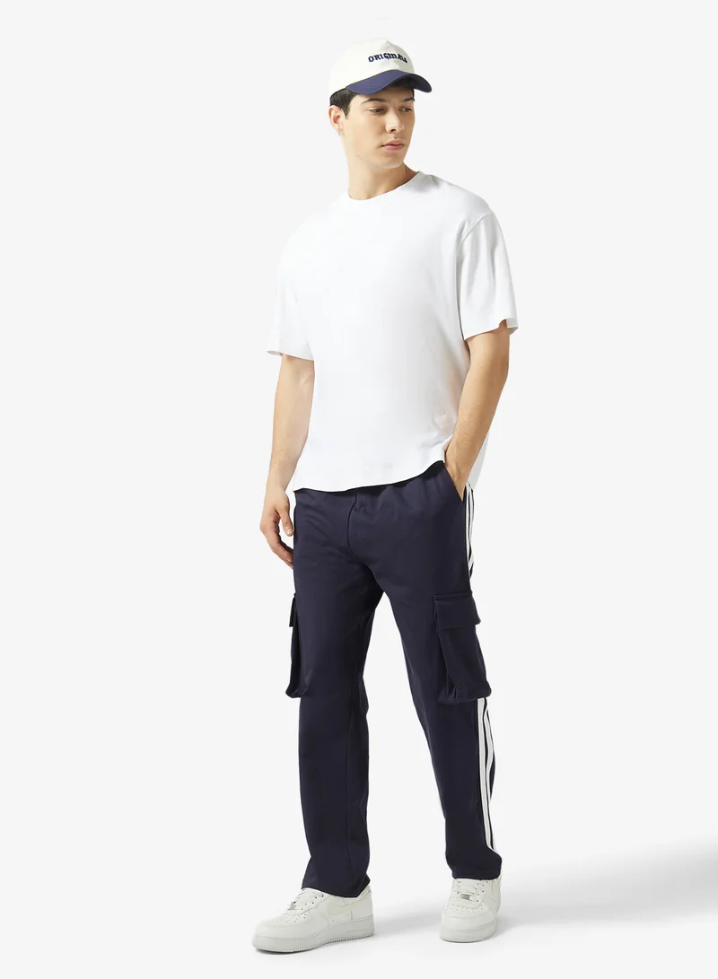 سفنتي فايف بنطلون رياضي واسع بجيوب جانبية