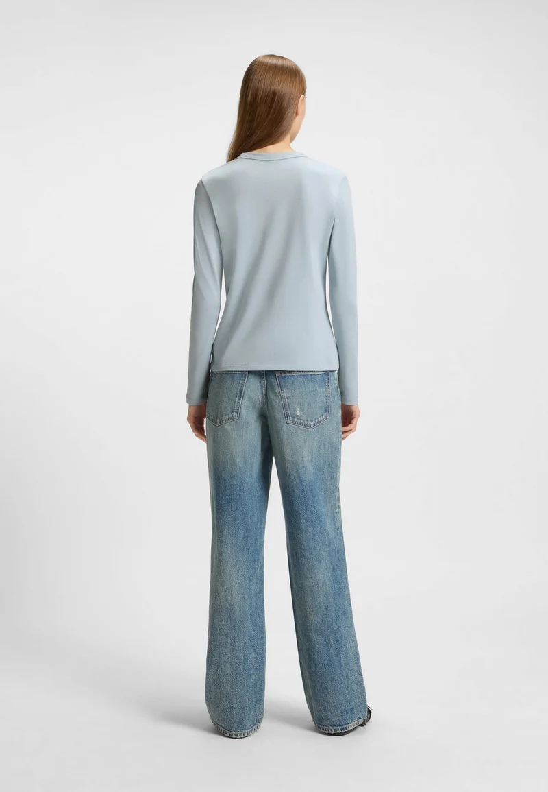 هوجو توب قطن جيرسيه بشعار هابي هوجو