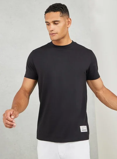 Styli Styli Badge Detail Mock Neck Regular Fit T-Shirt