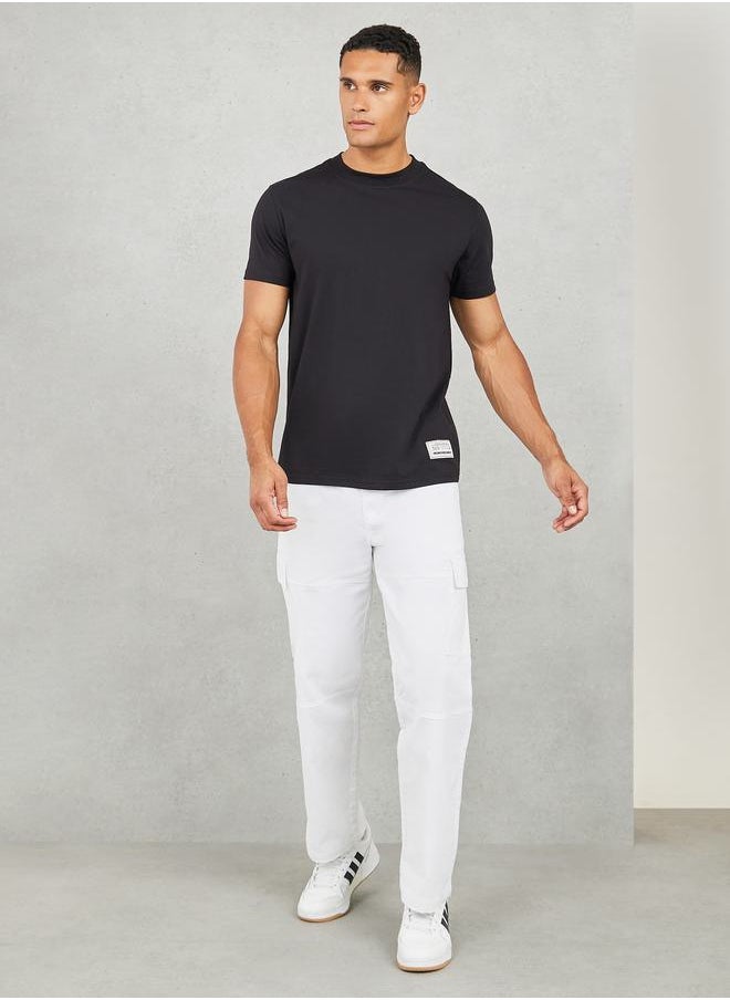 Badge Detail Mock Neck Regular Fit T-Shirt - pzsku/ZB4E3EFFD20A00A64FBD0Z/45/_/1723636500/76b1fcf2-827b-40f9-899d-39c03f8c5a76