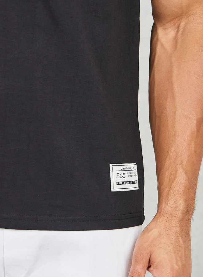 Styli Styli Badge Detail Mock Neck Regular Fit T-Shirt