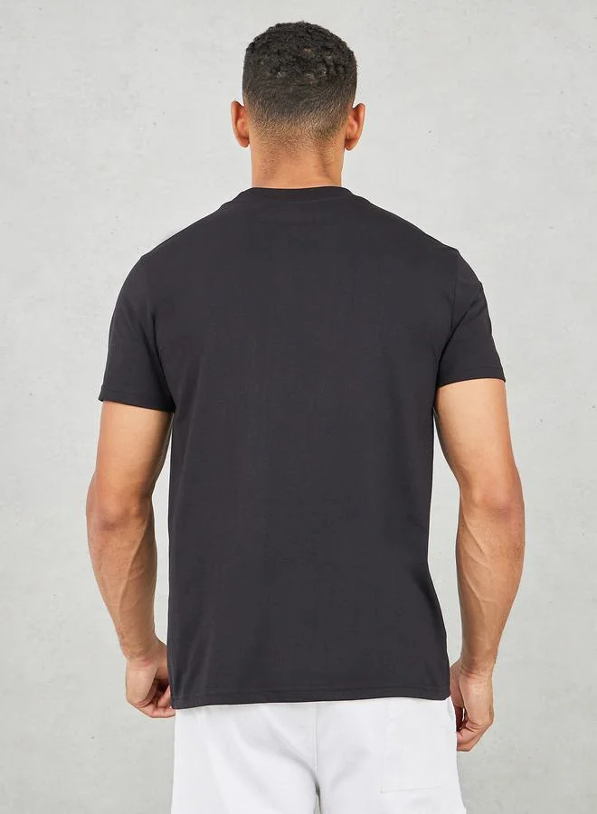 Styli Styli Badge Detail Mock Neck Regular Fit T-Shirt