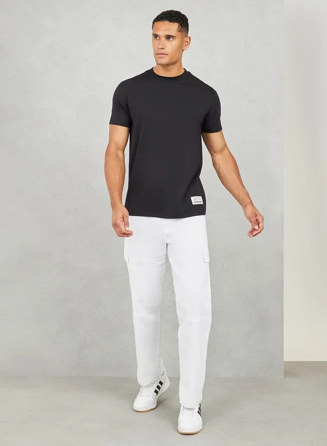 Styli Styli Badge Detail Mock Neck Regular Fit T-Shirt