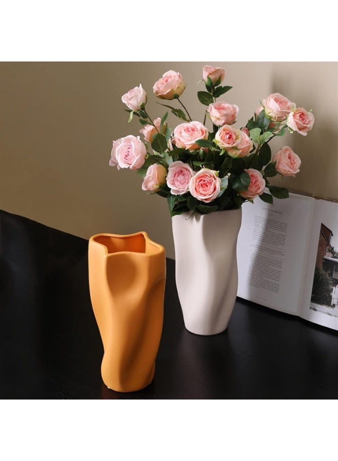Razz Gallery The Pink Wavy Vase is a decorative piece that combines softness with artistic details to give any space a sense of luxury and harmony. - Image 4