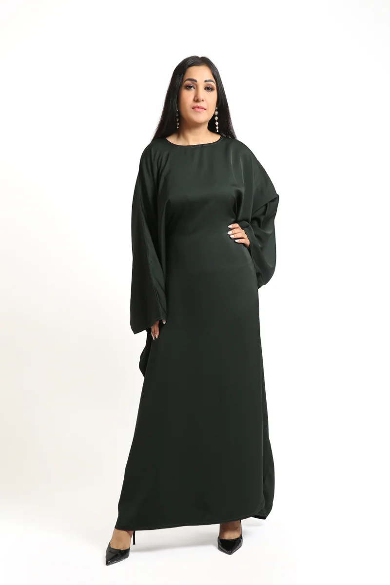 نيكياس عباية الفراشة باللون الأخضر الزجاجي من قماش النيدا بمظهر أنيق.