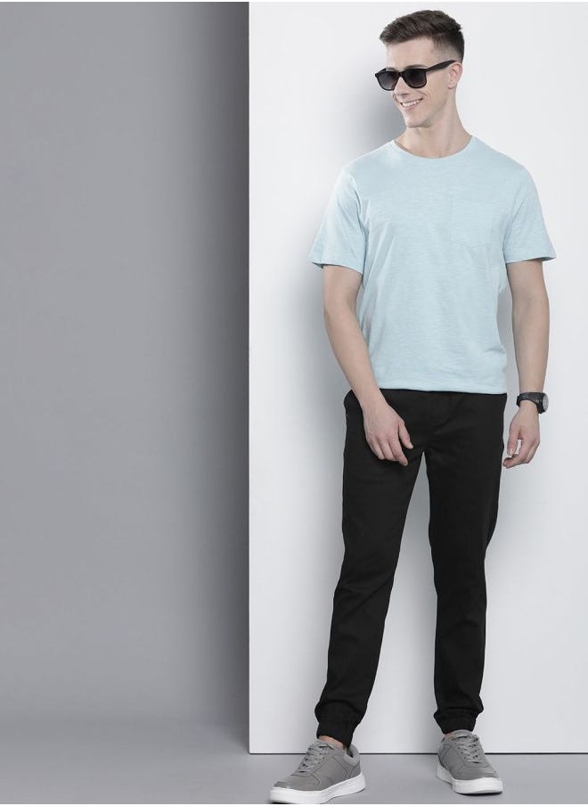 The Indian Garage Co Men Slim Fit Solid Mid-Rise Stretchable Chino Joggers  - Image 4