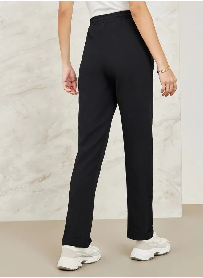 Styli Textured Tapered Fit Pants with Pockets