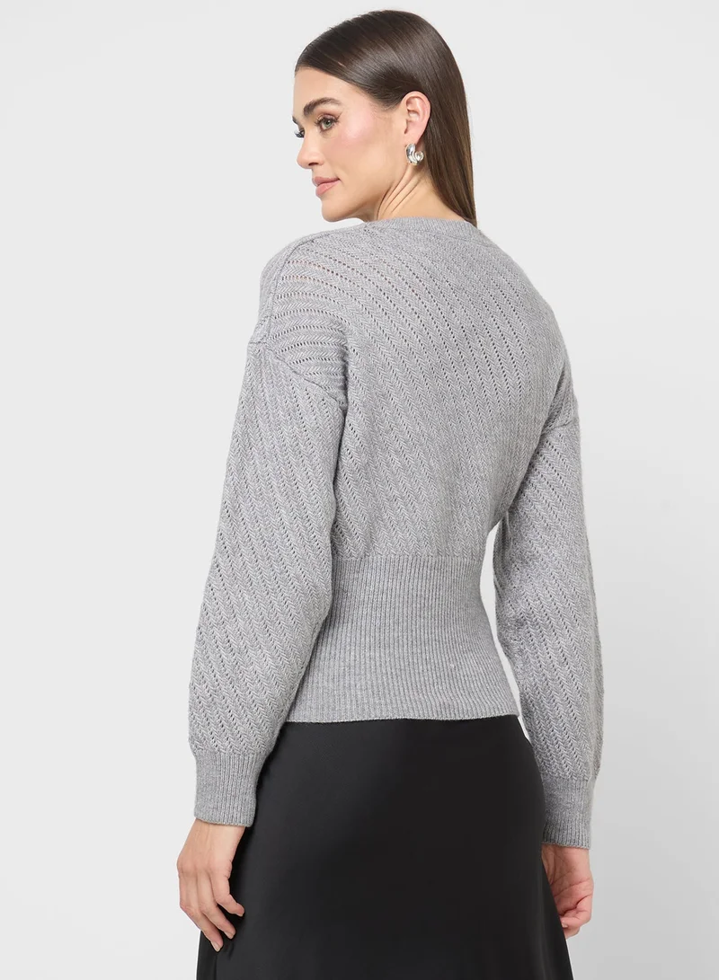 ايلا كنزة بياقة مستديرة قصيرة