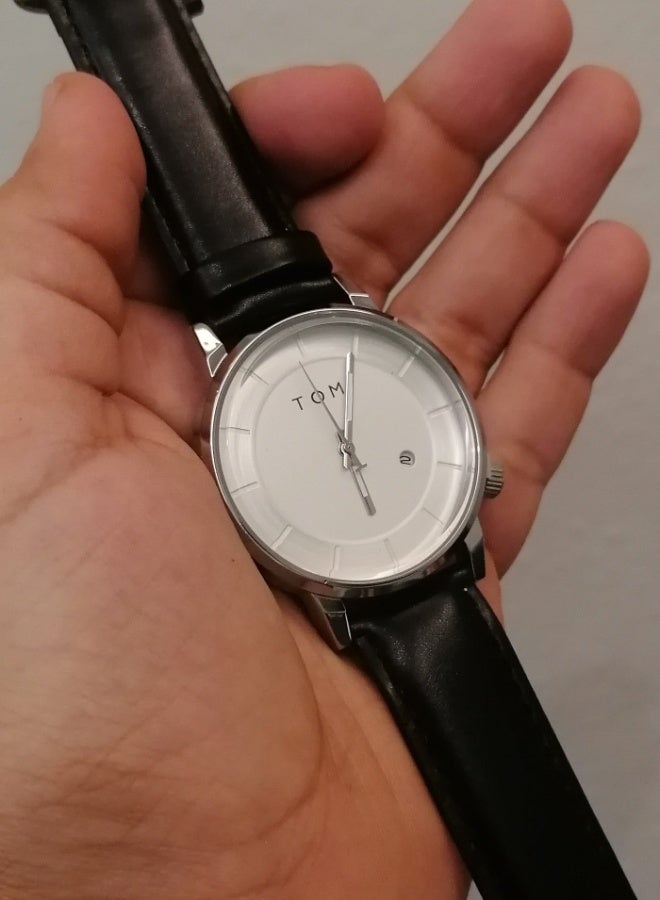 TOMI Watch With a Black Leather Strap With Analog Dials For Both Men And Women, In Addition To Displaying The Date On a Daily Basis - Image 3