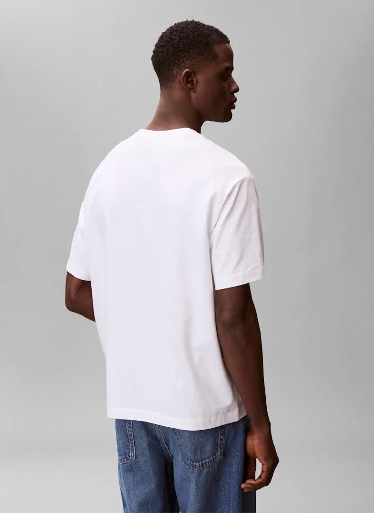 Calvin Klein Jeans  Relaxed Fit Logo Graphic T-Shirt for Men | Best Price UAE