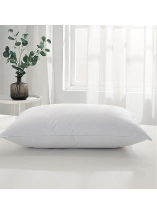 A soft and comfortable microfiber pillow that gives a feel similar to hotel pillows. - Image 1
