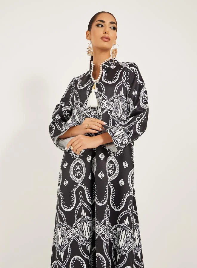 Styli digital print satnd collar jalabiya with lace and tassel trim at neck