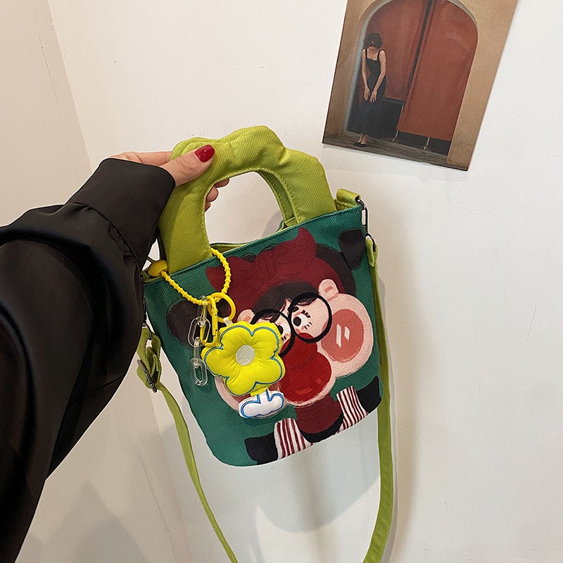 Women's Canvas Bucket Shoulder Bag with Cute Graffiti Print - Image 2