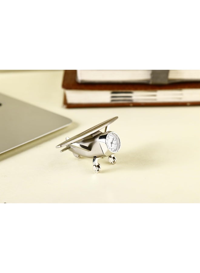 Decor ساعة طاولة تناظرية بتصميم طائرة وزن ورق معدني قطعة عرض للطاولة في المنزل أو المكتب باللون الفضي 7 × 10 × 5 سم - Image 4