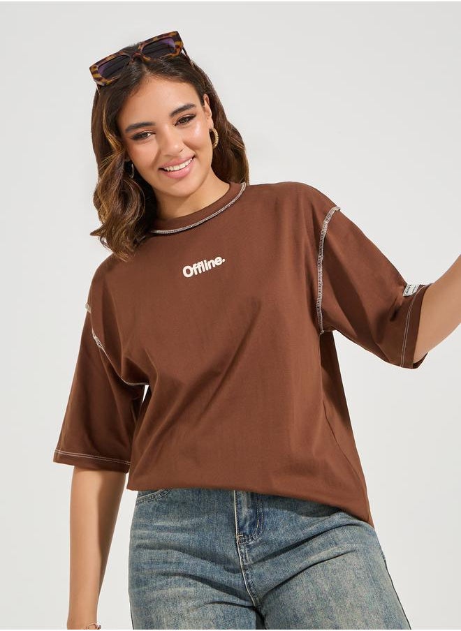 Styli Oversized Drop Shoulder Slogan T-Shirt with Exposed Seam  - Image 4