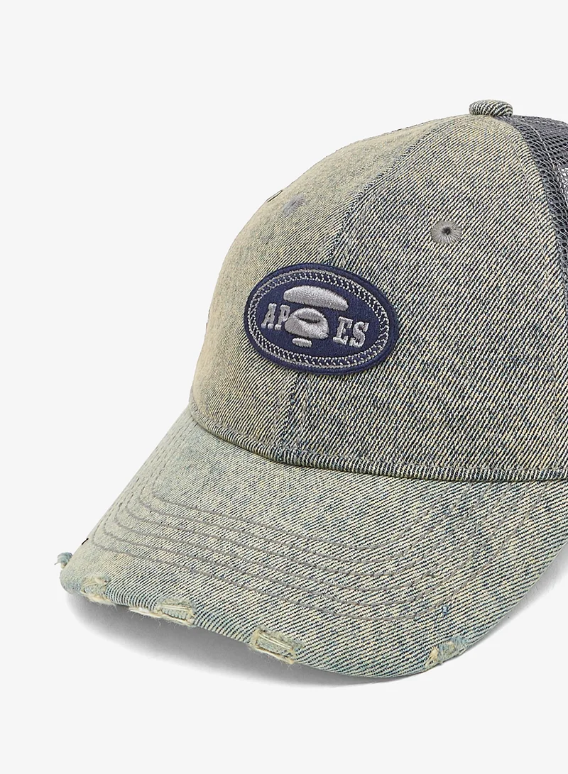 ايه ايه بي إي قبعة جينز ممزقة بشعار مون فيس