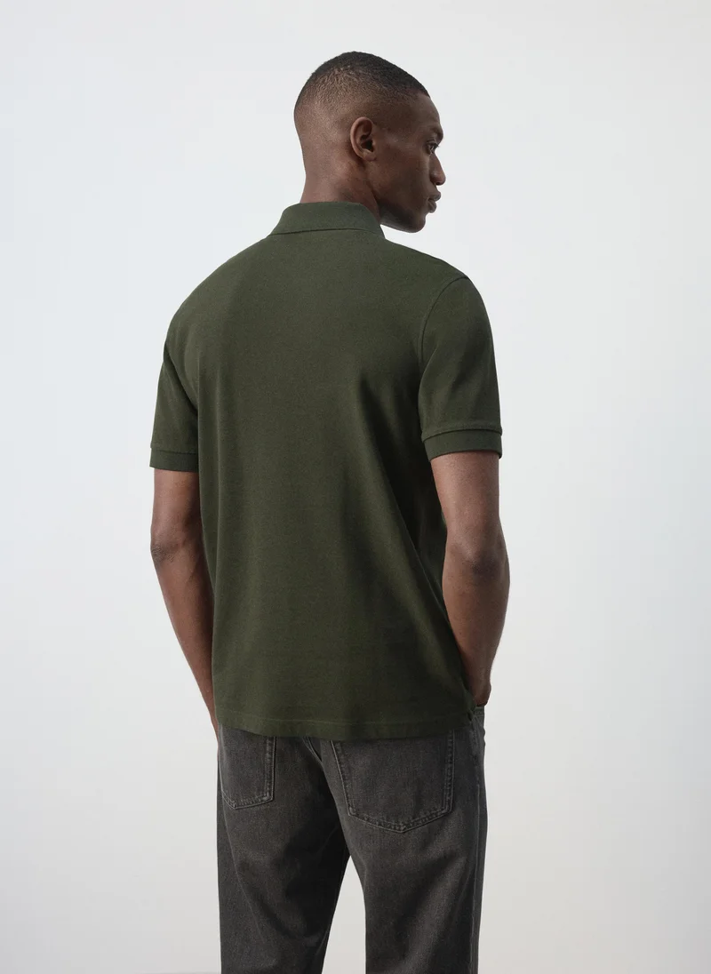 مانجو مان Polo Shirt Rea