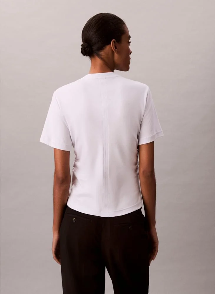 كالفن كلاين جينز تيشيرت بياقة دائرية مزين برسمة