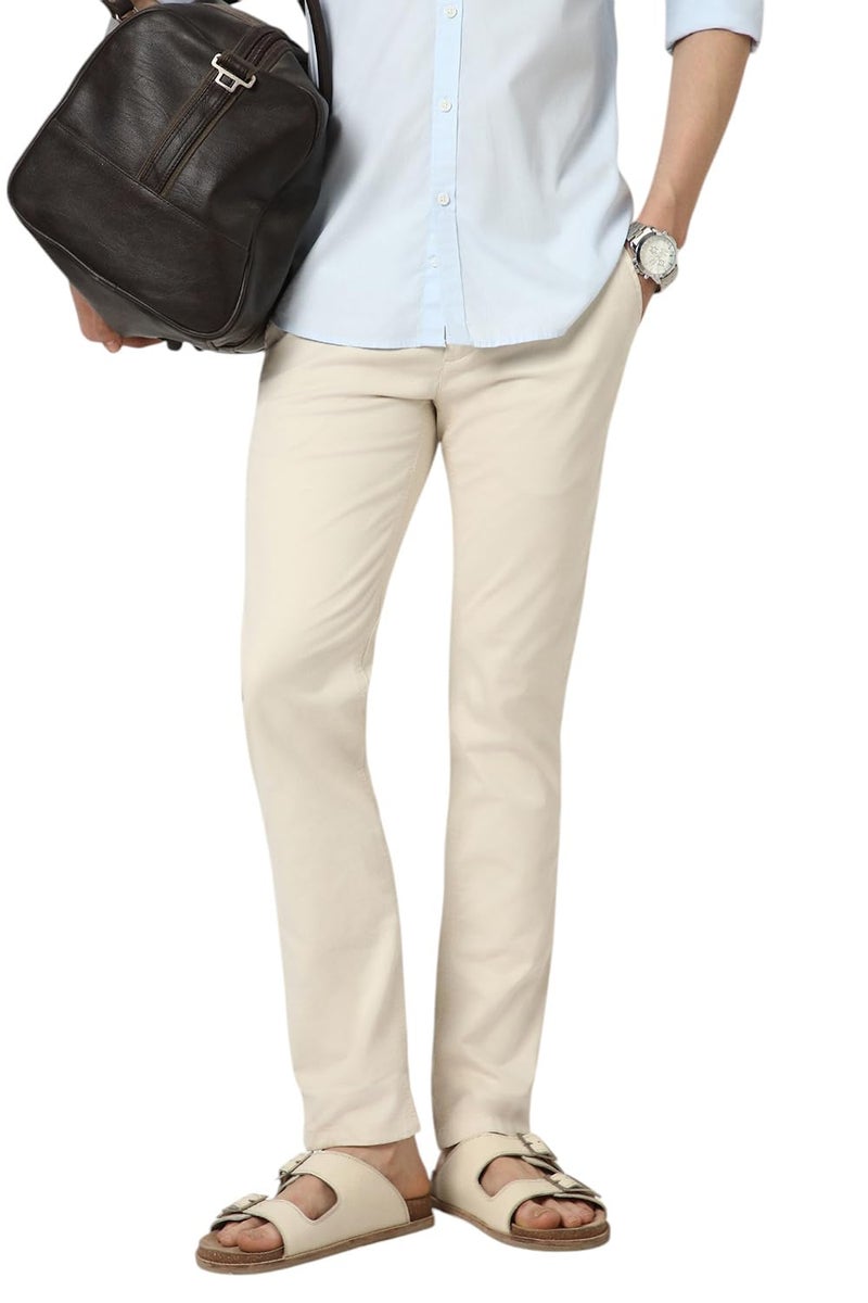 Peter England Men Cream Solid Low Skinny Fit Trousers - Image 1