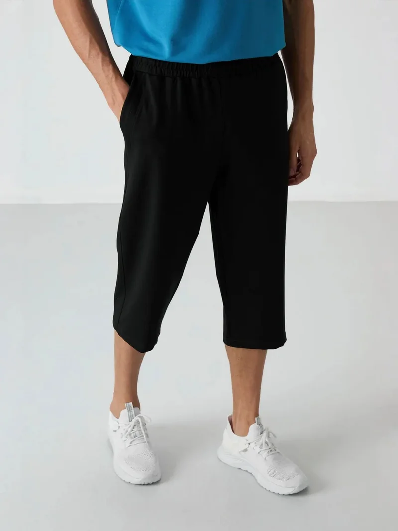 تومي لايف TOMMY Men's Mid-waist Wide-leg Capri Shorts