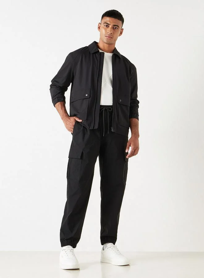 ستارتر بنطلون رياضي كارجو سادة بقصّة عادية مع خصر مرن وجيوب من ستارتر