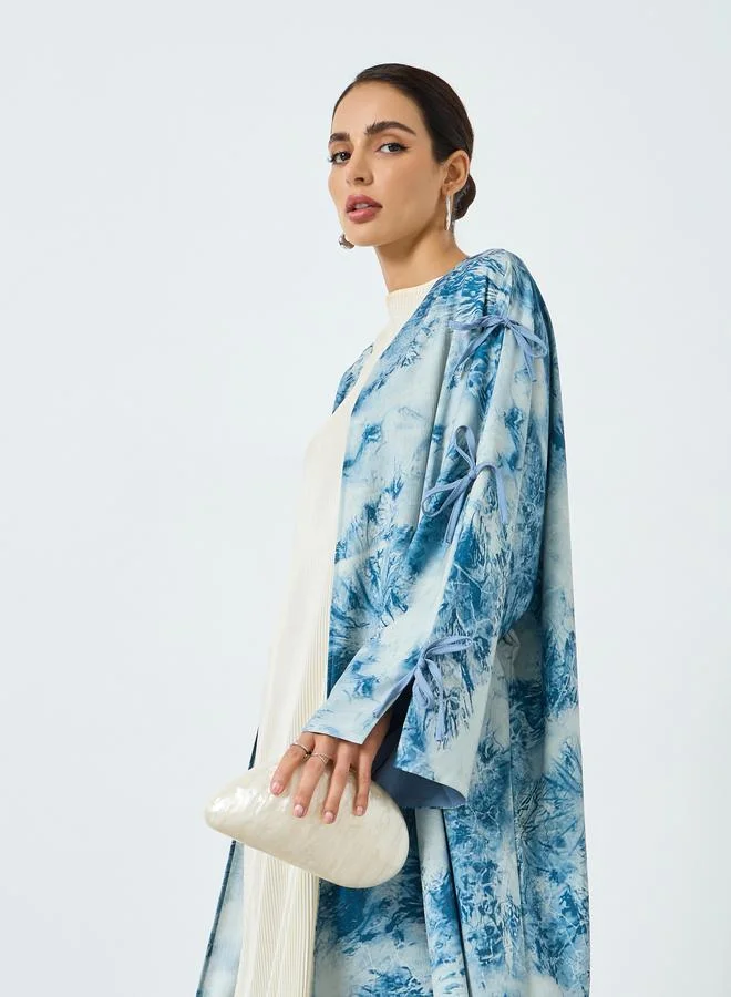 تايك تو عبايةة بأكمام طويلة وطبعة جرافيك