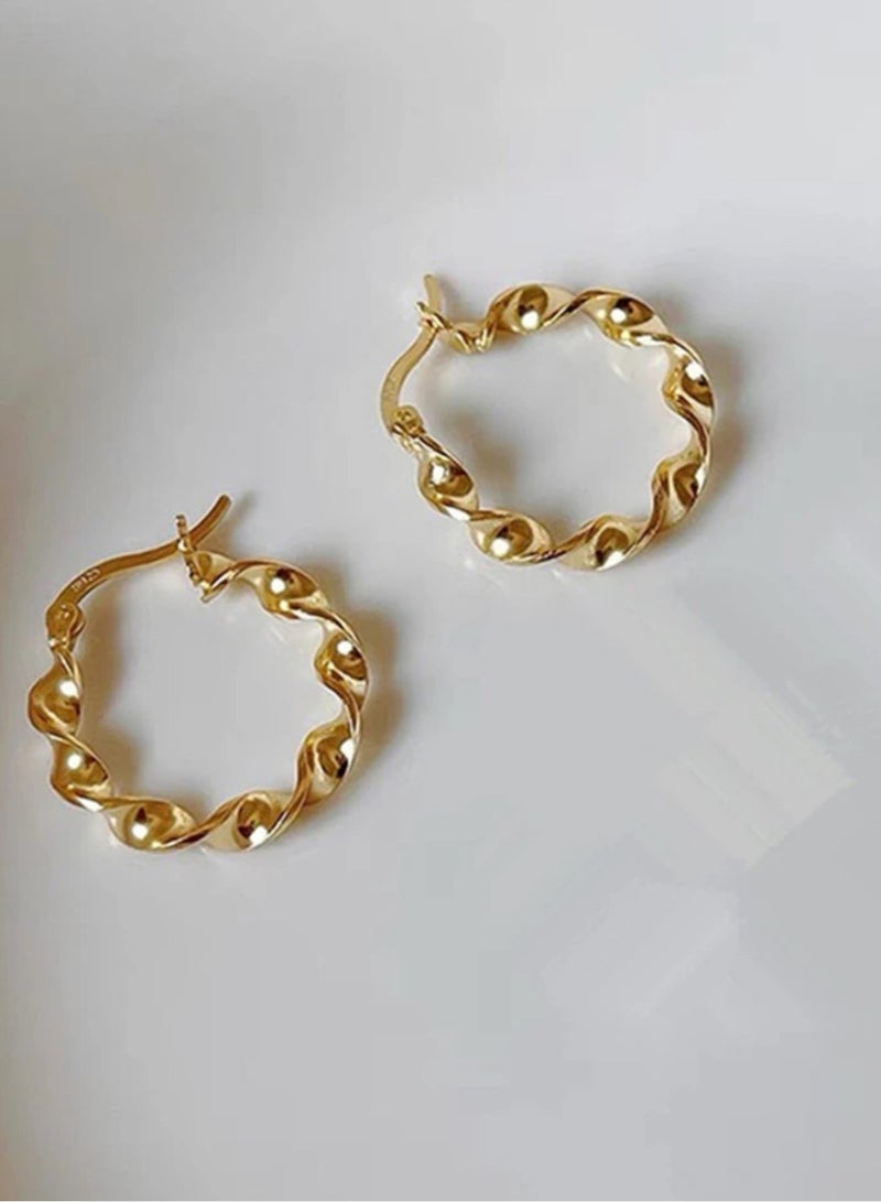 إيكوال حلق اذن نسائي دائري من الاستانلس ستيل أنيق وعالي الجودة باللون الذهبي - Image 2