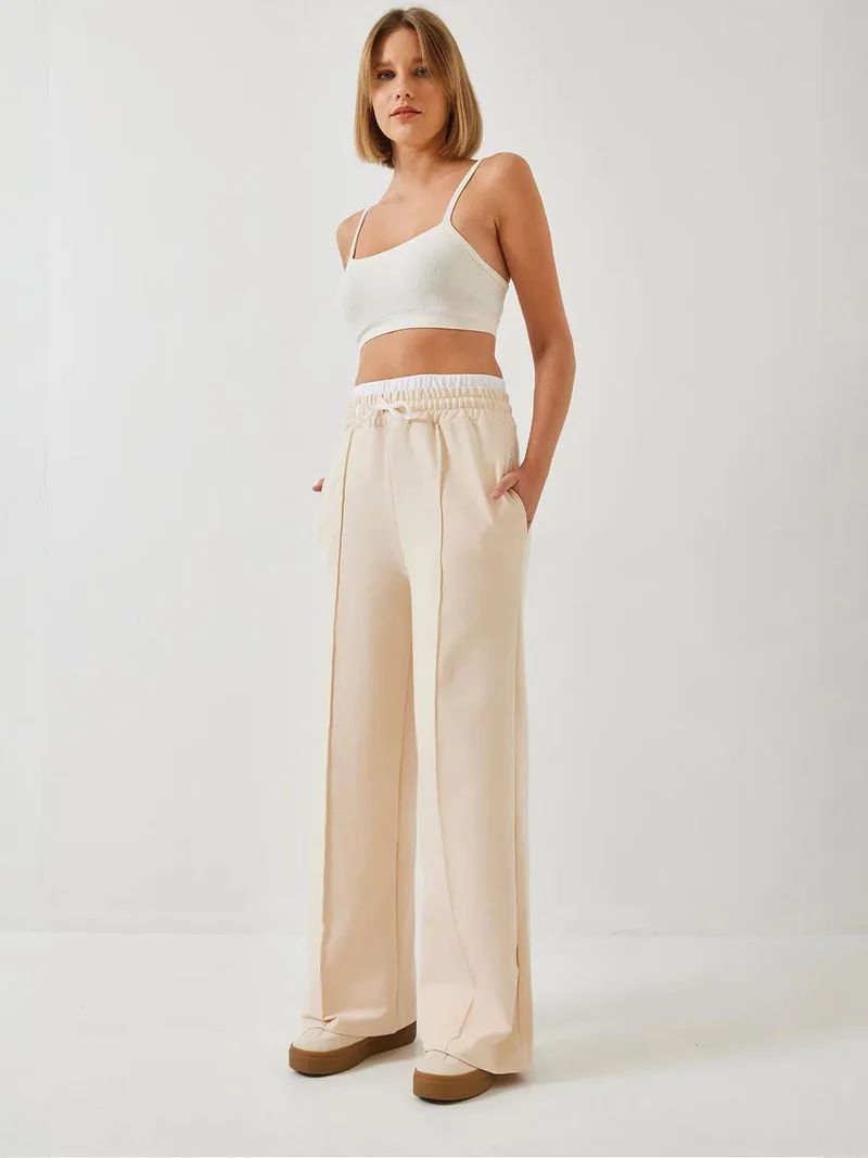 بيانكو لوتشي بنطلون لوكسي واسع الساق مع حزام