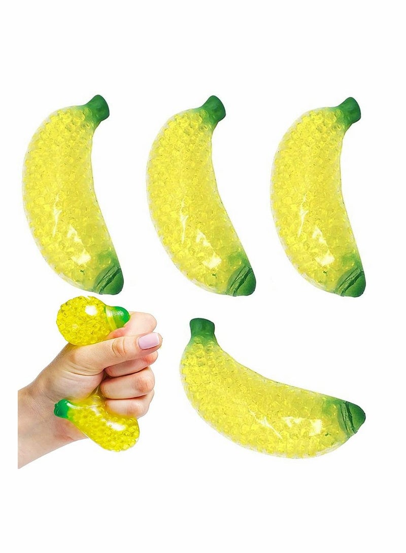 KASTWAVE ٤ قطع لعبة ضغط قلق موزة مصنوعة موز اصطناعي للراحة من التوتر لعب مزخرف موزة لعبة توتر فاكهة مزيفة ديكور منزل ومطبخ موزة مرنة للكبار والأطفال - Image 1