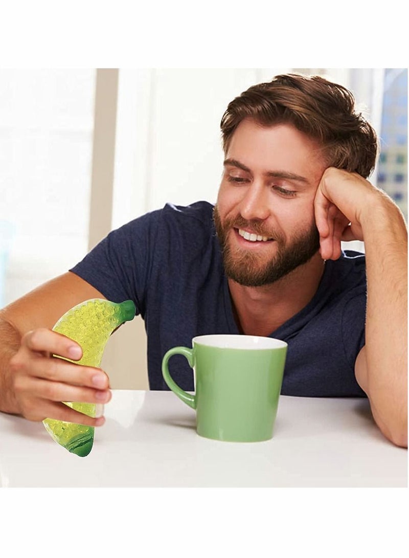 KASTWAVE ٤ قطع لعبة ضغط قلق موزة مصنوعة موز اصطناعي للراحة من التوتر لعب مزخرف موزة لعبة توتر فاكهة مزيفة ديكور منزل ومطبخ موزة مرنة للكبار والأطفال - Image 2