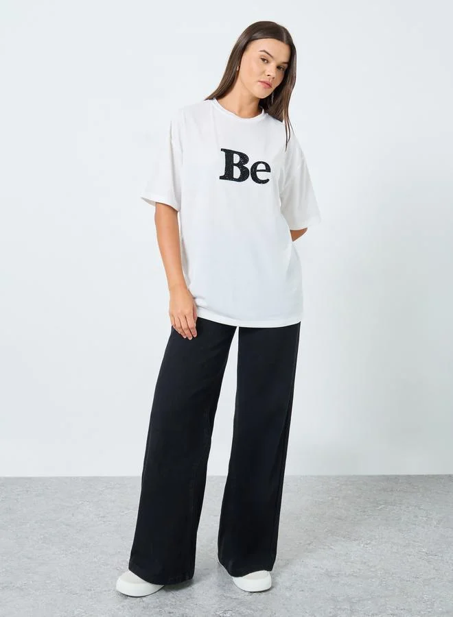 Styli Styli White Oversized Embellished Slogan T-Shirt