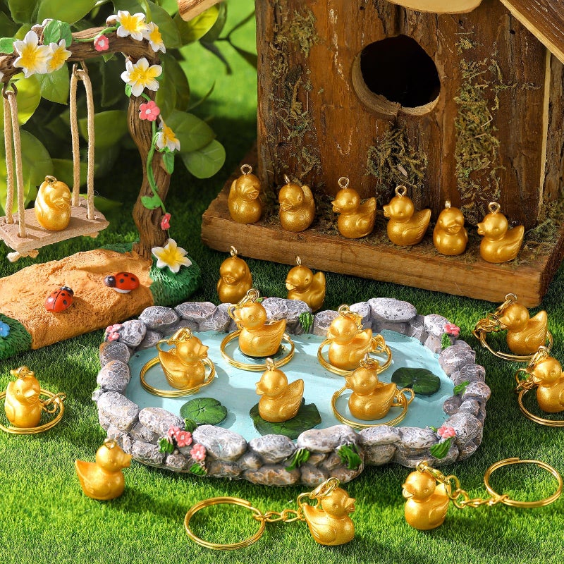 Ecation 100 Pcs Luminous Mini Gold Duck Keychains Glow in The Dark Resin Duck 3D Tiny Key Chains Bulk Small Animal Pendant for Holiday Gifts Birthday Party Favors - Image 2