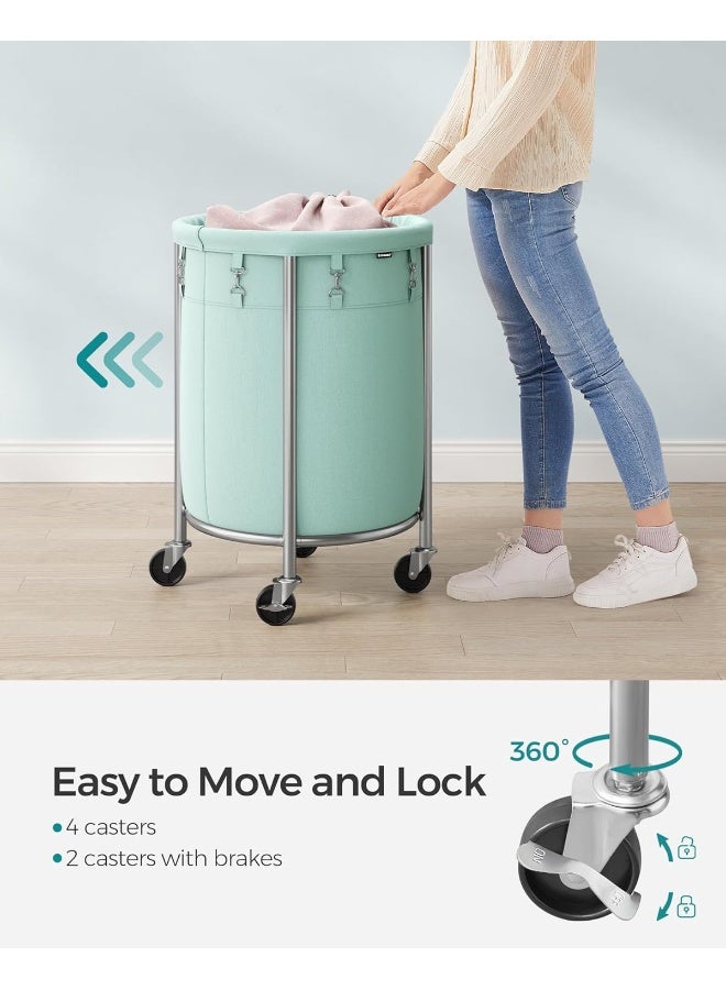 SONGMICS سلة غسيل SONGMICS بعجلات، سلة غسيل متحركة، سعة 29 جالون، عربة غسيل دائرية بإطار فولاذي وحقيبة قابلة للإزالة، 4 عجلات و2 فرامل، أخضر نعناعي وفضي معدني - Image 4