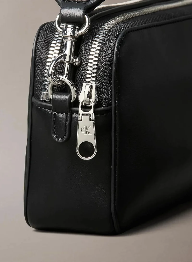 Calvin Klein CK BLACK / SHINY NICKEL Convertible 2-Strap Crossbody Camera Bag for Women | Best Price UAE