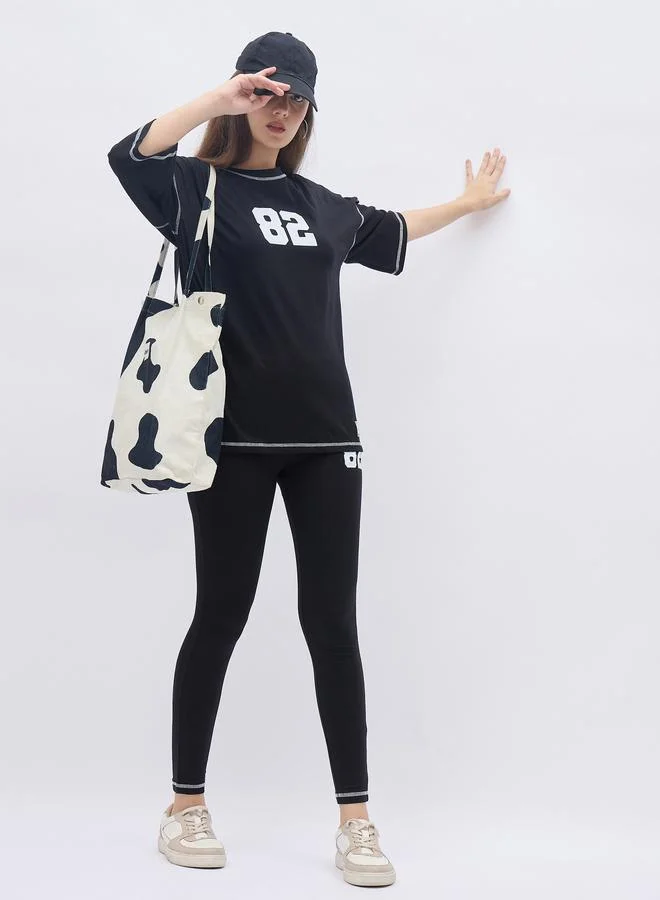Styli Styli Graphic Oversized T-Shirt and Badge Detail Leggings Co-Ords