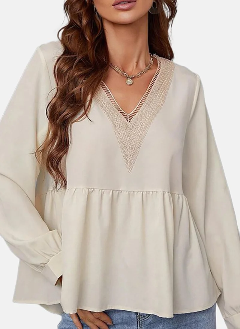 يونيكي Beige Solid Relaxed Long Sleeve Top