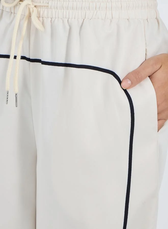 Styli Contrast Piping Detail Toggle Hem Relaxed Fit Pants
