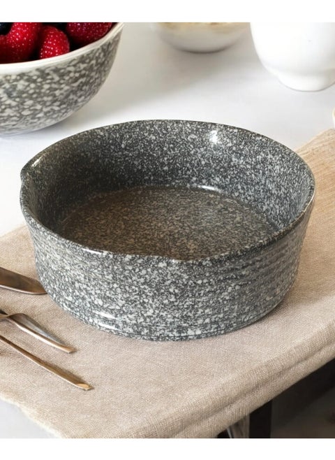 A ceramic and porcelain tray that can withstand direct and indirect heat, from a flame or inside the oven.
