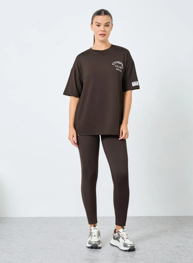 Gymspire Edition - Label and Tab Back Waist Pocket Leggings