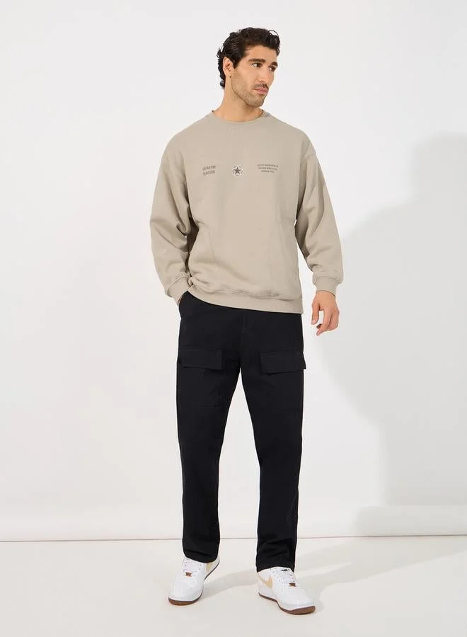 ستايلي سويت شيرت بقصة بوكسي وحواف بأساور