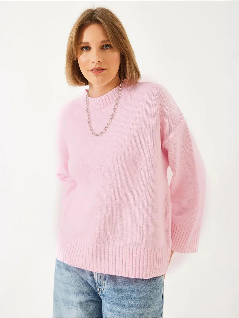 بيانكو لوتشي كنزة بياقة مستديرة واسعة مضلعة من لوتشي