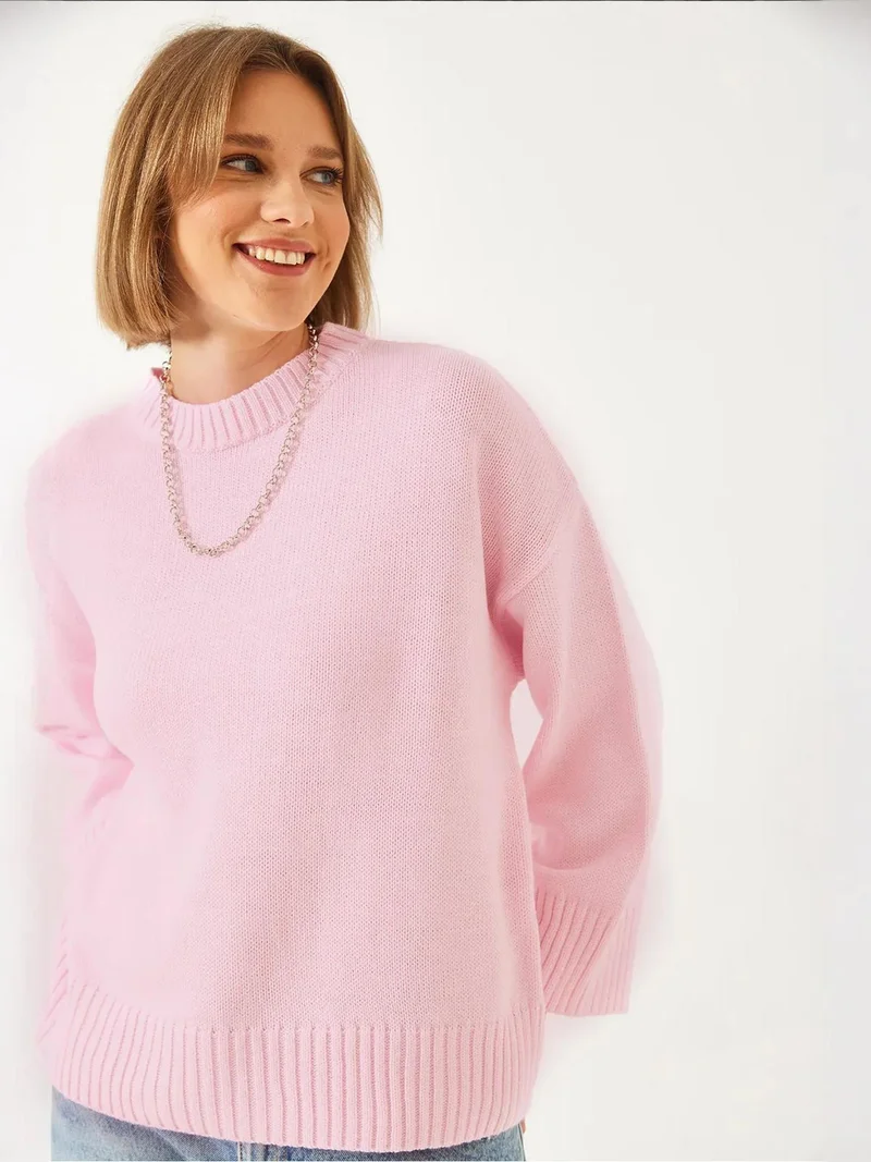 بيانكو لوتشي كنزة بياقة مستديرة واسعة مضلعة من لوتشي